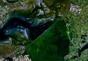 Satellite_image_of_Afsluitdijk,_Netherlands_(5.19E_53.02N)